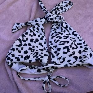 A cow print swim suit